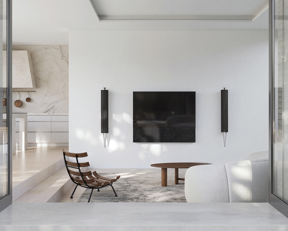 FITUEYES ZEN TM65 Fabric TV mount centered on a white living room wall between two wall lights