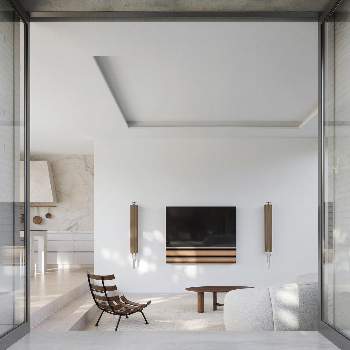 A Picasso stand next to a sculptural counter and colorful dining chairs