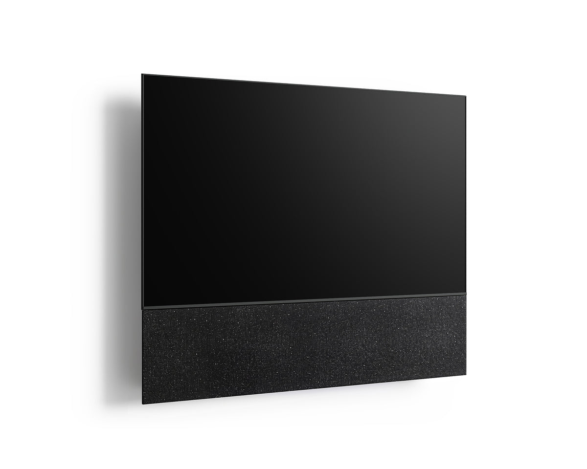 Angled front view of the FITUEYES ZEN TM65 Fabric TV mount with a TV and black fabric panel on a white background